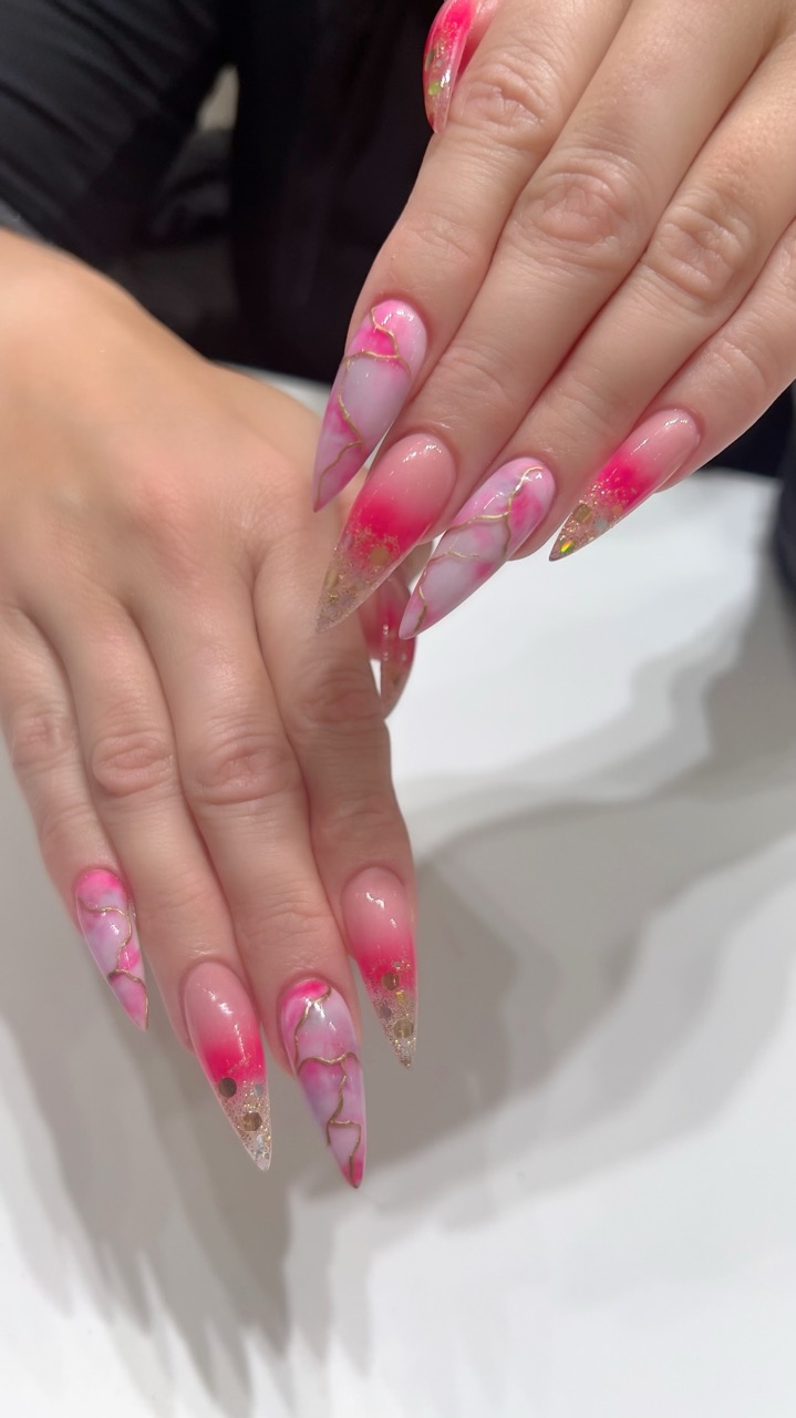 French manicure with delicate gold leaf